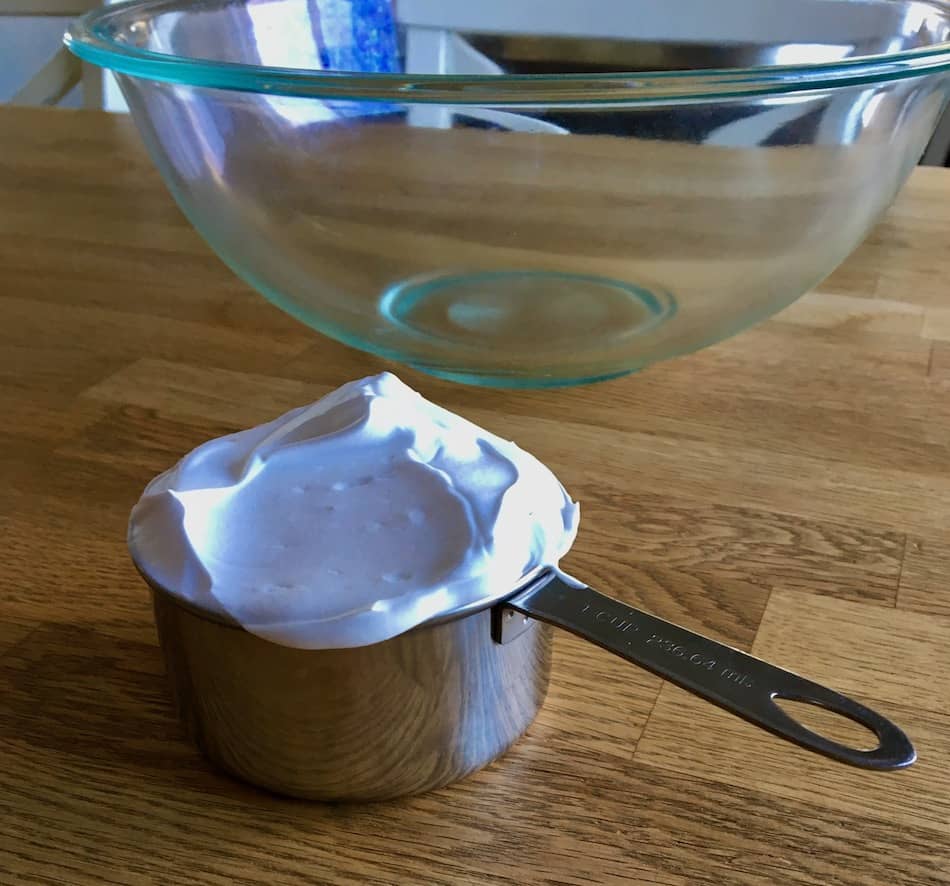 cup full of shaving cream